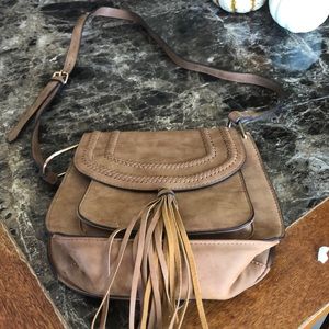 Brown cross body tasseled purse